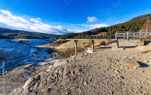 Lack of water in a water reservoir lake photo