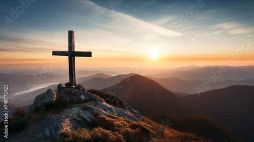 The cross stands on the top of the mountain.