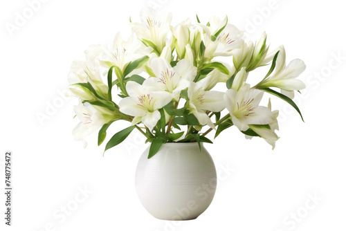 A white vase sits on top of a wooden table, filled with white flowers. The simple yet elegant arrangement adds a touch of freshness to the room.