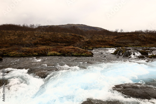 Fototapeta Naklejka Na Ścianę i Meble -  Brúará is a spring-fed river in West Iceland which runs by the boundaries of municipalities Biskupstungur and Grímsnes