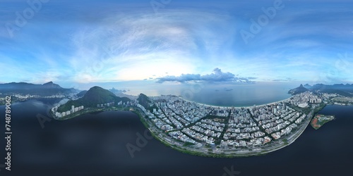 360 aerial photo taken with drone over lake in Ipanema between Corcovado and beach at sunrise