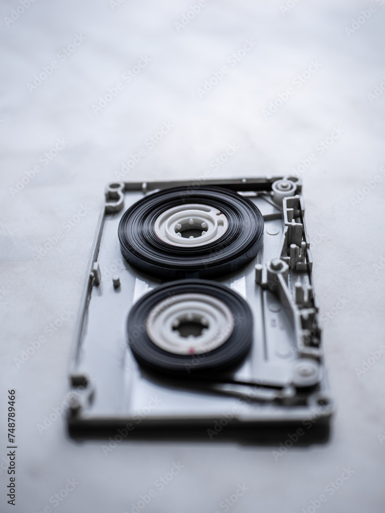 Old white compact cassette tape mechanism inside