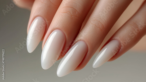 Beautiful manicure  neat nails with white gel polish
