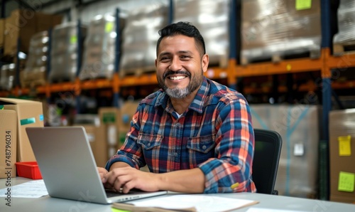 Middle aged hispanic warehouse distribution logistic deliery centre manager or employee preofessional smiling at camera with toothy smile surrounded with shelves with cardboard boxes