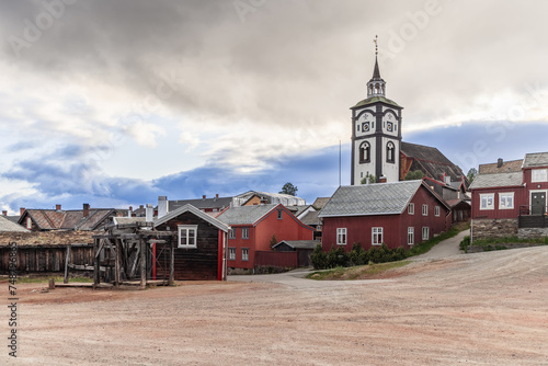 The old mine elevator in Roros, a relic of the mining era and Roros Kirke, capturing the essence of this historic Norwegian town photo