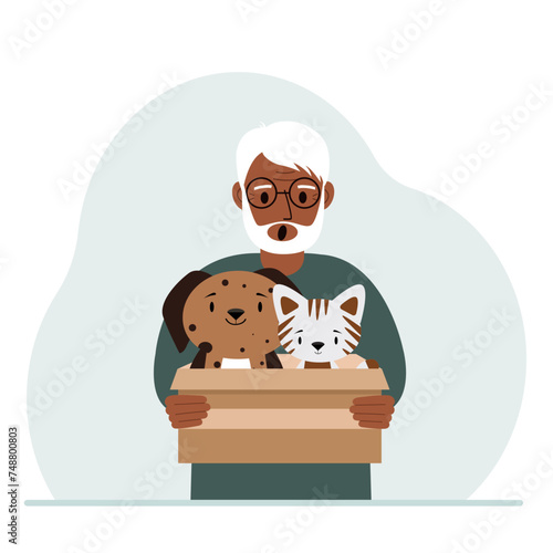 A man holds a cardboard box with a cat and a dog. The concept of rescue, help and care for pets.