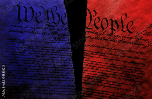 Torn US Constitution with red and blue split representing division in US politics