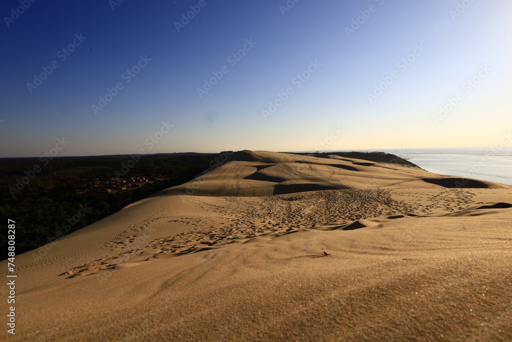 The Dune of Pilat is the tallest sand dune in Europe. It is located in La Teste-de-Buch in the Arcachon Bay area, France