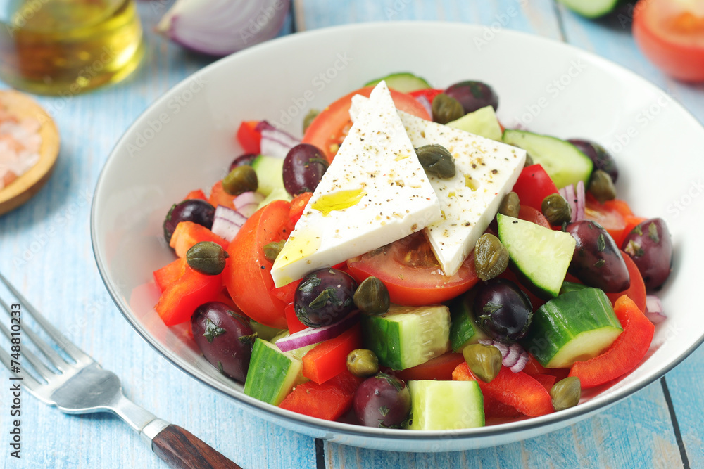A bowl with traditional Greek salad Horiatiki A bowl with traditional Greek salad Horiatiki