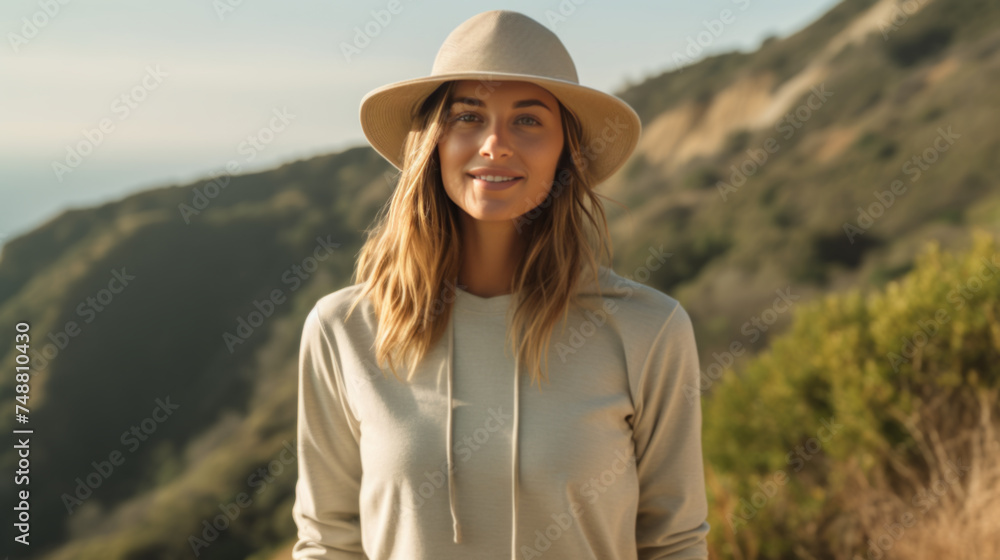 Serene Woman Standing in Golden Field at Sunset