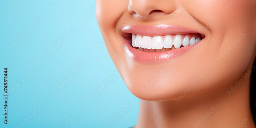 Obraz premium Female beautiful snow-white smile, perfect white teeth, face close-up on blue background, profile, copy space
