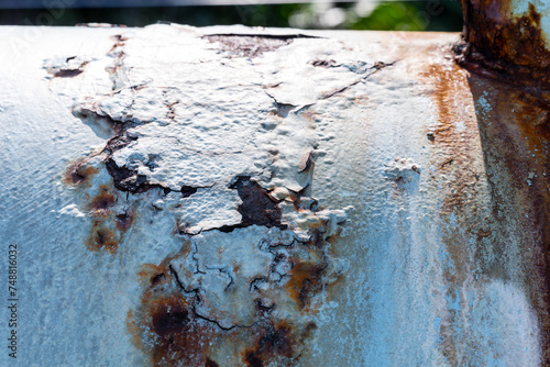 Rusty Metal Grunge Texture on the wall of an old water pipe. Corrosion of objects. © Kanthita