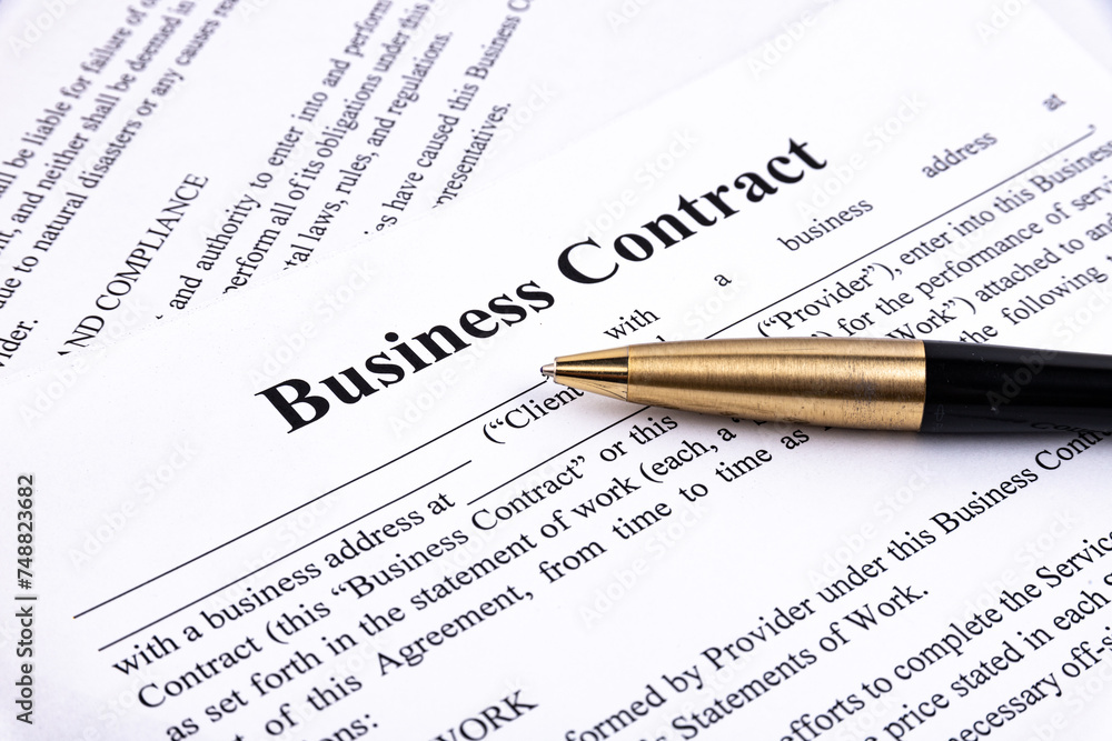 The pen lies on the contract. Business relationship concept. The pen lies on the contract. Business relationship concept.