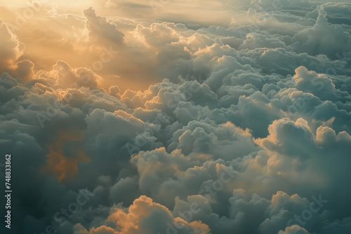Aerial view of a cloudscape illuminated by sunlight © ParinApril