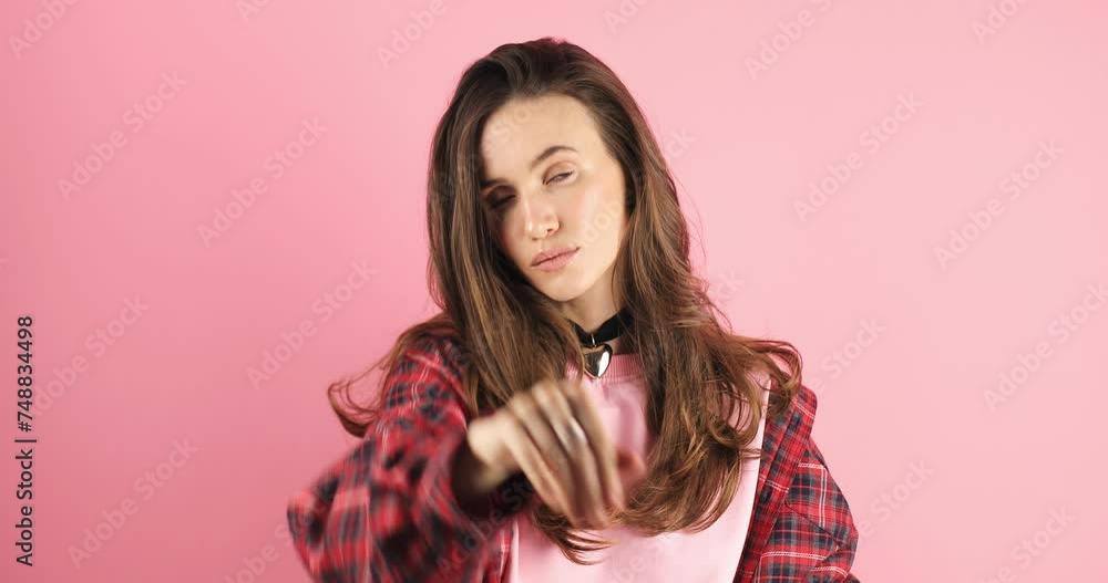 Brunette woman making hands stop action sign. I said, no. Angry frustrated young woman showing crossed arms in x gesture sign and looks on camera. Forbidden gesture standing isolated pink background Brunette woman making hands stop action sign. I said, no. Angry frustrated young woman showing crossed arms in x gesture sign and looks on camera. Forbidden gesture standing isolated pink background