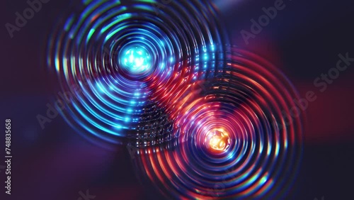 Red and Blue Glowinf Spheres and their soundwaves intercept with each other photo