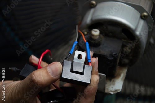 Capacitors in the fan motor circuit