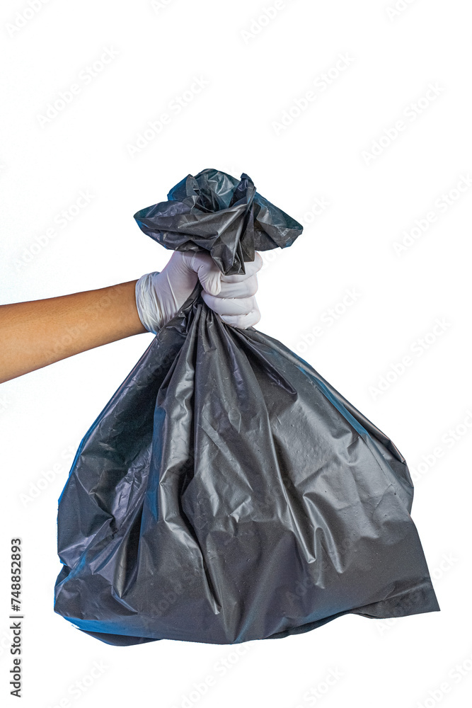 The male hand holding a garbage bag on white back