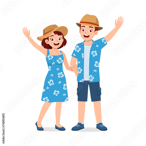 young couple standing and ready for vacation