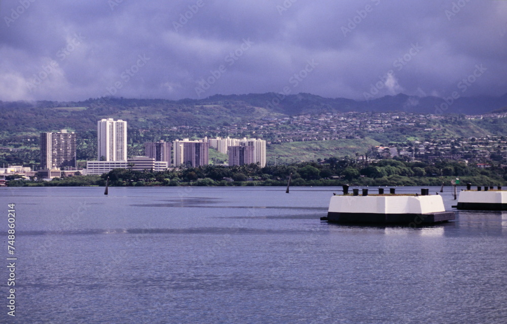 Naklejka premium View of The USS Arizona national historic memorial and Pearl Harbor HONOLULU, HAWAII, USA during early 1990s