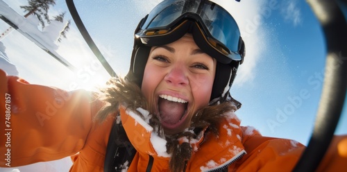 a snowboarder is floating above the snow on a ski lift