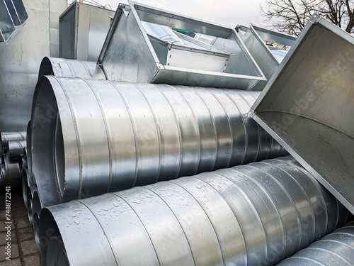 Stack of Aluminum Air Tubes and Ducts photo