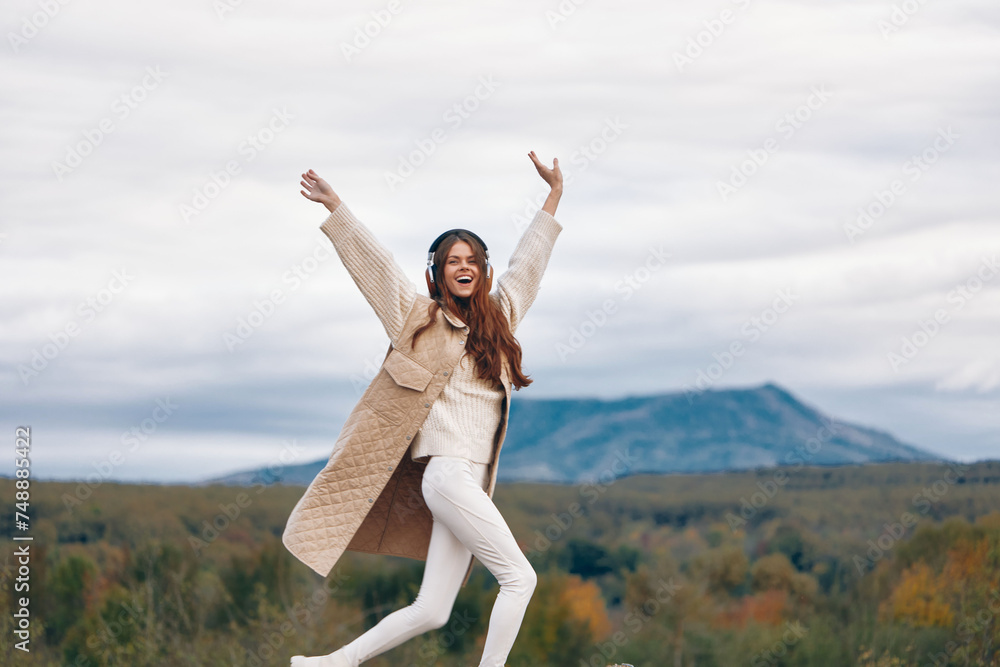 Walking Through the Mountains: A Hipster Woman Embracing Nature's Music. Walking Through the Mountains: A Hipster Woman Embracing Nature's Music.