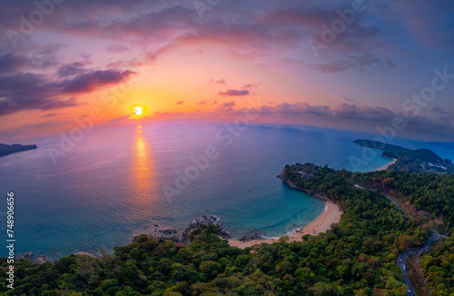 Aerial top view panorama sunset Laem Sing beach with sea of Phuket paradise. Concept tropical travel photo Surin, Thailand