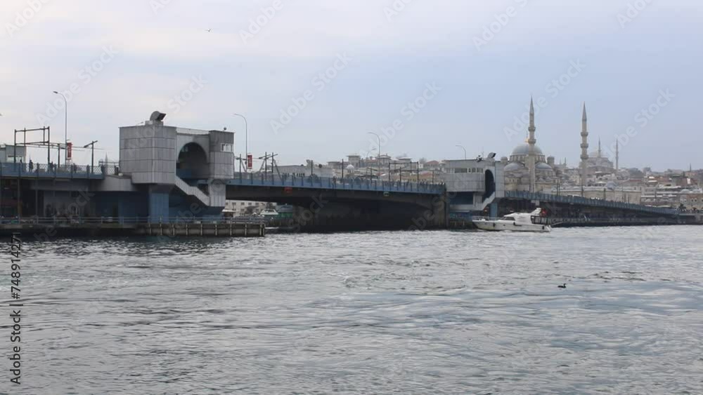 Ferry move to Eminönü terminal at morning time, view from other vessel departed from Europe side. Eminönü ,İstanbul Ferry move to Eminönü terminal at morning time, view from other vessel departed from Europe side. Eminönü ,İstanbul
