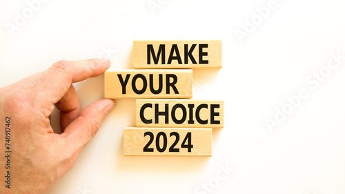 Make your choice 2024 symbol. Concept words Make your choice 2024 on beautiful wooden block. Beautiful white table white background. Voter hand. Business Make your choice 2024 concept. Copy space.