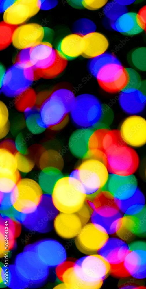intentionally blurred background of many colorful lights of red yellow green uscsia blue colors ideal as abstract background vertical intentionally blurred background of many colorful lights of red yellow green uscsia blue colors ideal as abstract background vertical