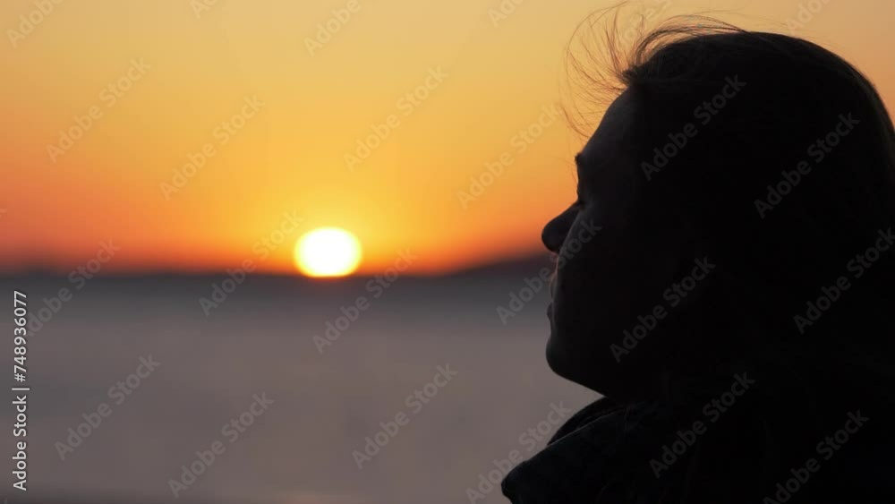 sadness, problems- sad woman by the sea at sunset closes her eyes thinking sadness, problems- sad woman by the sea at sunset closes her eyes thinking