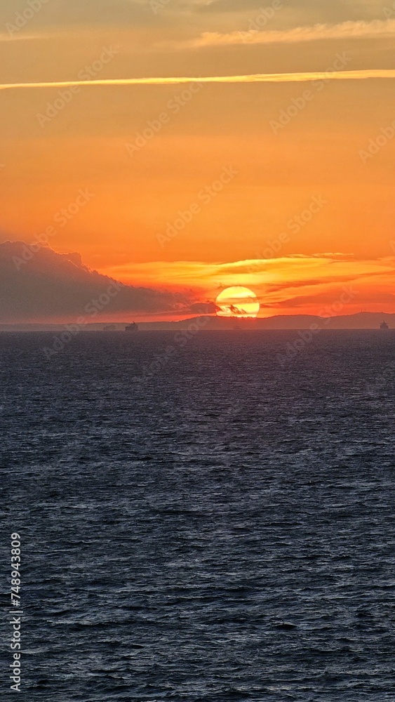 Beautiful sunset from the side of the cruise liner