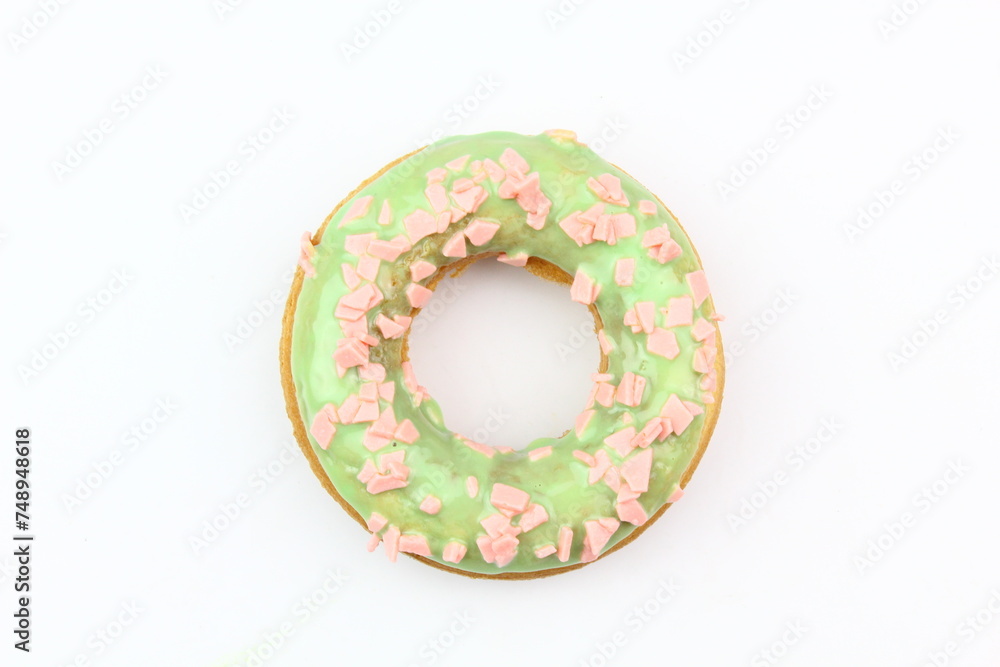 Sweet strawberry glazed donuts with sprinkles on white background, Delicious colorful donuts isolated on white background With clipping path. Sweet strawberry glazed donuts with sprinkles on white background, Delicious colorful donuts isolated on white background With clipping path.