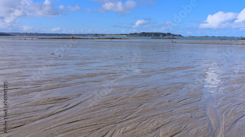 Beach of Lancieux, France during low tide photo