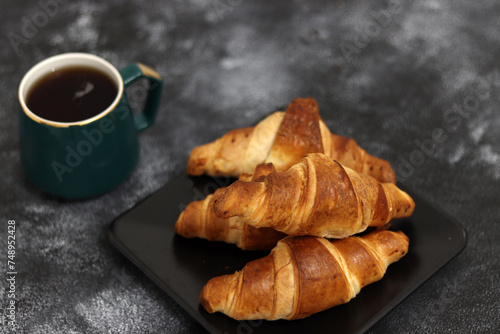 Freshly baked croissants, isolated on white background. 