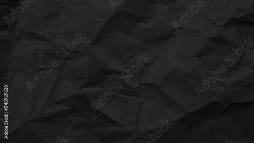 crumpled black paper Quick page turning photo