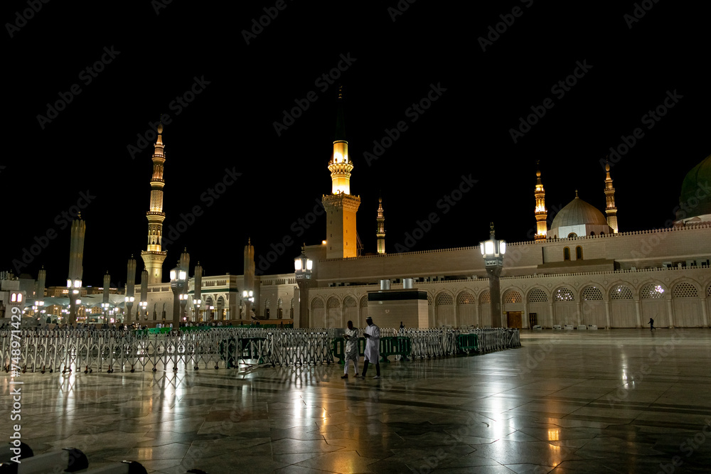 Masjid an-Nabawi or the Prophet's Mosque is the mosque built by the Islamic prophet Muhammad and his friends in Medina after the Hijra, which also contains the tomb of Muhammad.