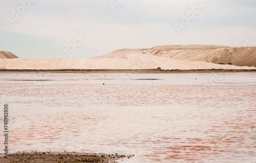 Obraz na płótnie Salins d’Aigues-Mortes, Camargue, France. Europe's largest salt marshes Salin-de-Giraud, sea salt production. Pink salt marshes. w salonie
