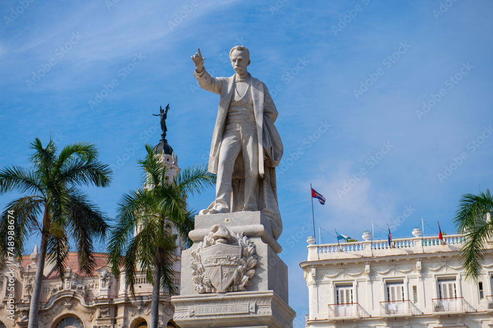 Jose Marti statue (Estatua a Jose Marti) at Central Park (Parque Central) in Old Havana (La Habana Vieja), Cuba. Old Havana is a World Heritage Site. 