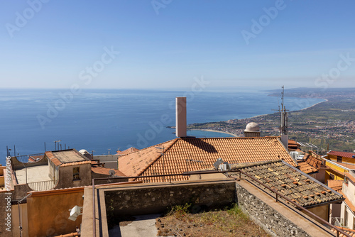 Aerial view of city on the bay of the Ionian Sea from Castle of Mola, Castelmola, Sicily, Italy