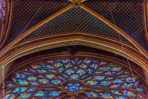 Paris, France - Dec. 27 2022: The stunning stained glass window and the beautiful ceiling in Saint-Chapelle in Paris