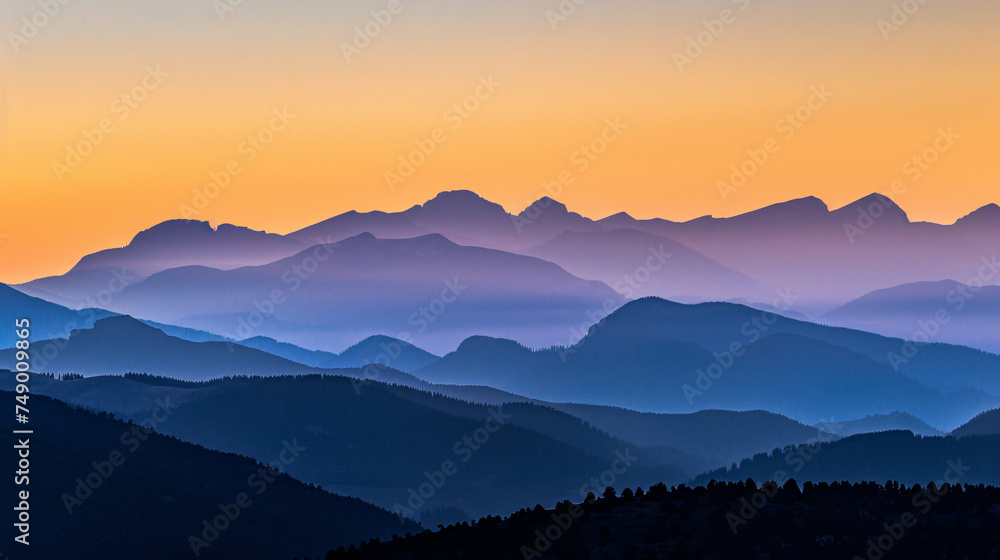 A mountain range silhouette at twilight.
