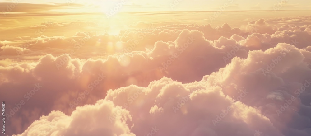 sunlight casting a warm glow on fluffy clouds