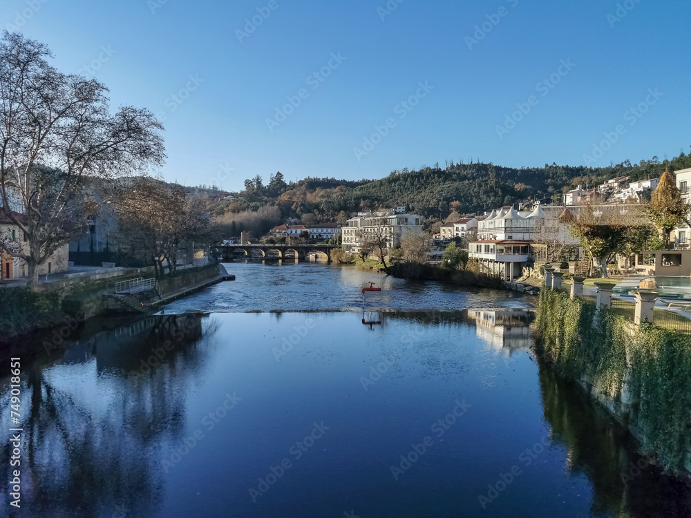 View of the thermal area of S. Pedro do Sul, Vouga River and buildings on the banks of the river supporting thermal spas, hotels and others, Viseu, Portugal