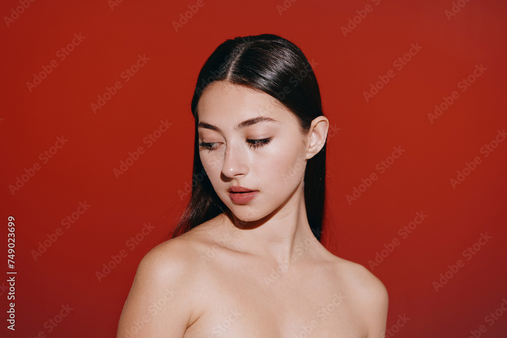 Beauty and Elegance: A Sensual Portrait of a Young Attractive Female Model with Perfect Skin, Hairstyle, and Make-up on a Clean White Background Beauty and Elegance: A Sensual Portrait of a Young Attractive Female Model with Perfect Skin, Hairstyle, and Make-up on a Clean White Background