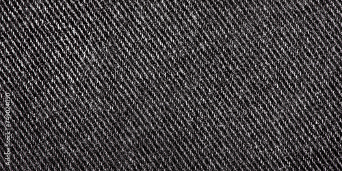 Black denim fabric macro photo. Jeans as a background. Fabric texture. photo