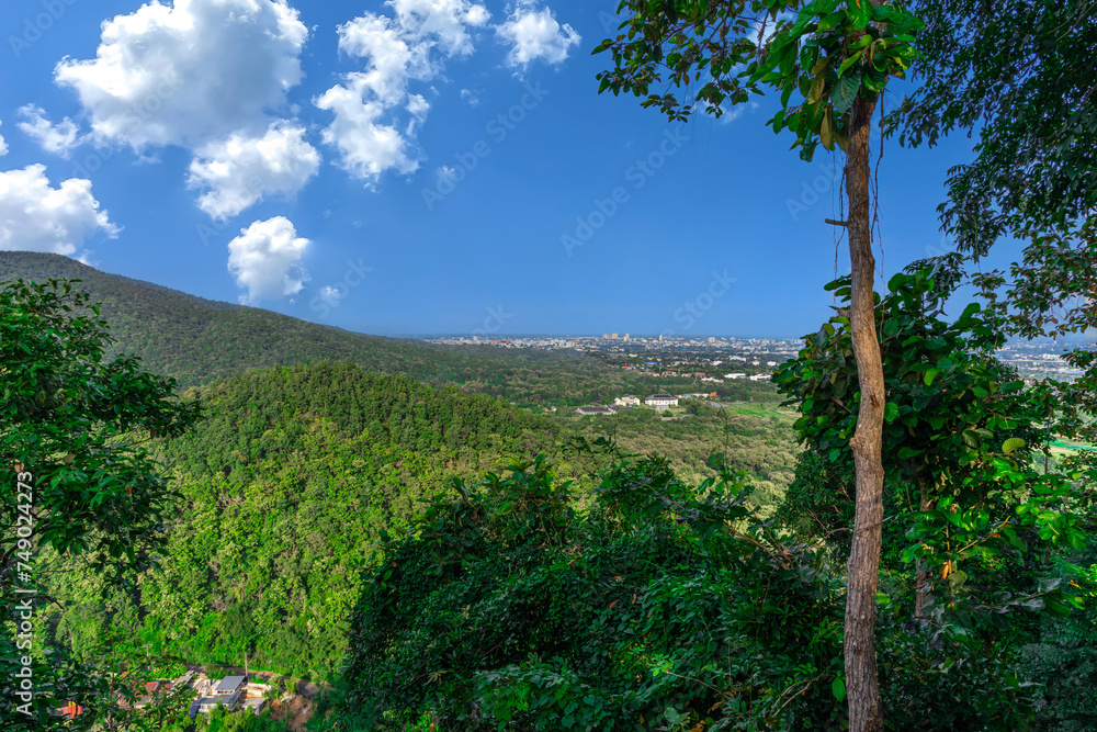 Fototapeta premium Panorama view of Chiangmai Chiang Mai city taken from Doi Suthep Mountains. Lovely views of the Old city at Sunset Sunrise lovely tropical mountains and beautiful nature in the foreground