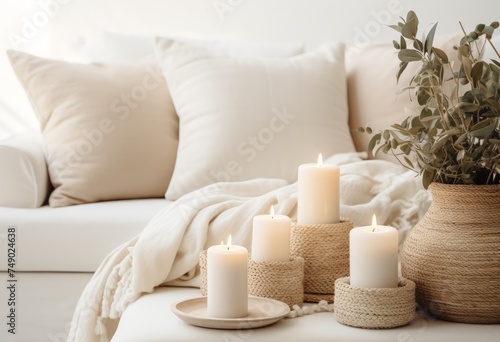 white sofa with candles and pots