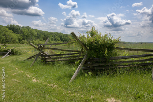Fototapeta Naklejka Na Ścianę i Meble -  Stacked wooden fence on the edge of the Gettysburg battlefield, site of the bloodiest battle of the Civil War. Pennsylvania